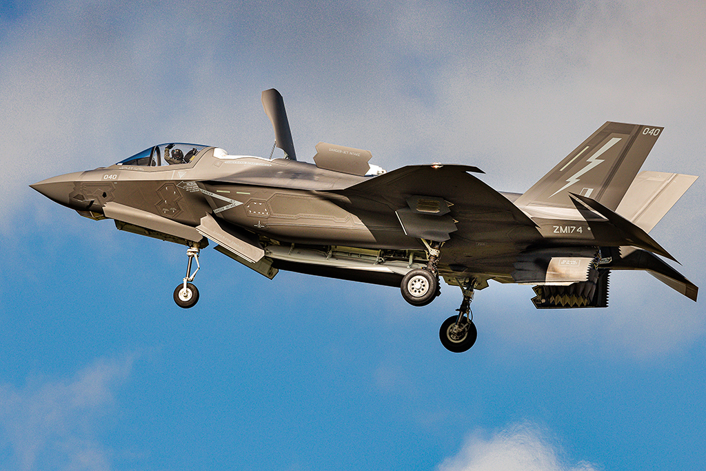 An F35 fighter hovering during an airborne display. Nose is pointing to the left.